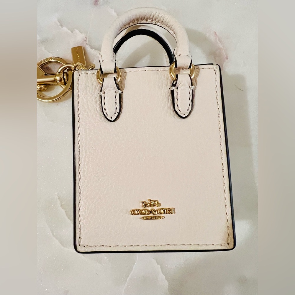 Coach Mini North South Bag Charm
Keychain in Chalk White, Gold
Hardware, New